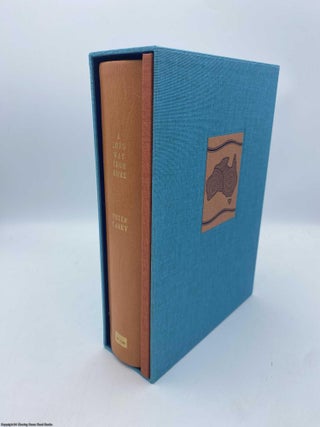 Item #092235 A Long Way from Home (Signed Limited LRB ed). Peter Carey